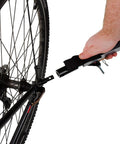 Attaching a steel bicycle trailer tow bar coupler with 45 degree welded hitch arm to a bike for kids, cargo, and pets black for everyday use.