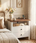 Set Of Two Modern Nightstands Featuring Double Drawers And Integrated Charging Station With Dual AC Outlets Plus USB Ports For Zero Wire Drama And Breezy Bedroom Refresh in a cozy bedroom setting.