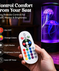 Lifelike Jellyfish Lamp With Sixteen Color Options And Four Modes Auto Shutoff Remote Controlled LED Night Light displayed with remote.