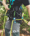 Person using Sidekick Lanyard Manager Auto Adjusts To Most Lanyard Diameters With One-Handed Operation And Multiple Attachment Orientations