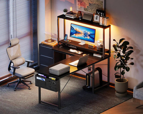 L Shaped Gaming Desk With LED Light And Power Outlet 53 Inch Reversible Computer Desk with shelves, chair in home office