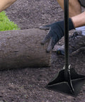 48 Inch Steel Tamper With Long Handle 8 By 8 Inch Garden Yard Tamper leveling soil next to rolled grass sod