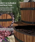 Close-up of Rustic Wood Barrel 3 Tier Outdoor Water Fountain With Electric Hand Pump Cascading Waterfall in garden