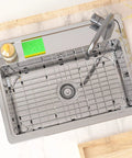 Top view of 26 Inch By 14 Inch Kitchen Sink Grid Protectors Set Heavy Duty Stainless Steel Bottom Grid With Center Drain Hole 3 Piece Metal Sink Grate Protector With Corner Radius For Large Sinks Easy To Install And Removable installed in a kitchen sink.