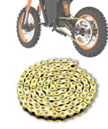 Gold Dirt Bike Chain for Tuttio Soleil 01, Carbon Steel Electric Motorcycle Chain, Precision 420 Size, displayed near a dirt bike