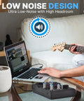Person using Five Channel Portable Audio Mixer With USB Interface And Rechargeable Battery Compact DJ Controller connected to laptop