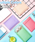 200-Count 4x6 Inch Bubble Mailers Waterproof Padded Envelopes Self Adhesive Poly Bubble Packaging in pastel colors on a desk