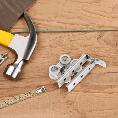 Heavy Duty Stainless Steel Sliding Door Pulleys With Smooth As Butter Bearings For Barn Door Wheels and Closet Track System displayed with tools.