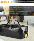 Beefy Heavy Duty Moving Bags Extra Large Storage Totes With Backpack Straps Strong Handles And Zippers An Easy Alternative To Moving Boxes For Packing And Storing Black 4 Pack displayed open in living room.