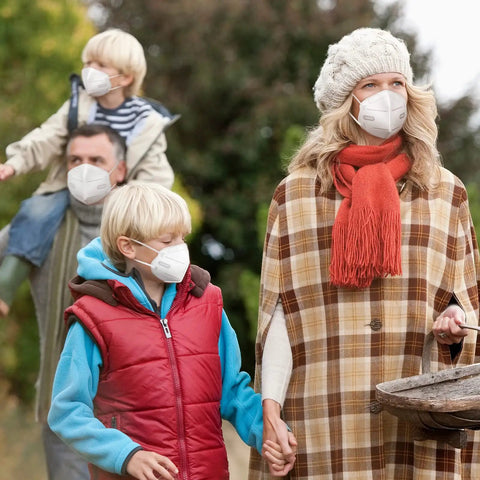 Family wearing KN95 Face Masks Pack of Fifty, Five Ply Disposable Masks, Breathable Comfy Fit, All Day Wear, High Filtration, White, Made in USA