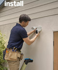 Man installing Floodlight Cam Pro Wired Security Camera With Retinal 4K Video Wide Angle View 10x Enhanced Zoom 2000 Lumen