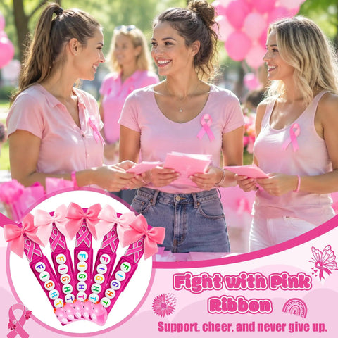 Three women in pink shirts with ribbon pins at a Breast Cancer Awareness Duck Cheer Pins Kit for Volleyball Squad and Team Spirit Crafting Includes 60 Rose Red Wooden Clothespins 60 Rose Red Mini Ducks 60 Pink Ribbon Charms 60 Ribbon Bows Five Bags of Letter Beads Fight and a Glue Tube.