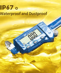 Six Inch Absolute Origin Digital Caliper In Stainless Steel, IP67 Water And Dust Resistant, floating on yellow liquid
