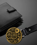 Handcrafted 3d Steampunk Gear Pewter Belt Buckle For Men And Women on black leather wallet backdrop.