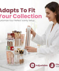 Woman using 360 Degree Rotating Makeup Organizer For Countertop With Adjustable Shelf Height, The Go To Round Spinning Cosmetic Organizer For Bedroom Dresser Or Vanity Storage, Clear Finish, on vanity