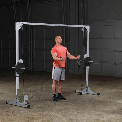 Beefy Heavy Duty Cable Crossover Machine For Home Gym Functional Trainer featuring dual high and low pulleys with user exercising.