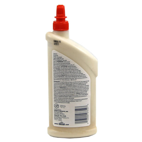 Back view of Carpenter's Wood Glue Max 1 Gallon Tan Extra Strength Wood Adhesive bottle showing label and instructions.