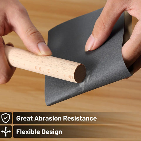 Hands demonstrating flexibility of 18 Piece Wet Dry Sandpaper Kit 120 To 3000 Grit For Metal Wood Automotive And Furniture
