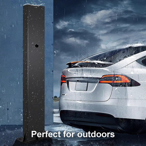 Badass EV Charger Cable Holder And Weatherproof Station Box For Outdoor Parking Spots Electric Vehicle Cord Protector Heavy Duty Carbon Steel Quick Install Rack For Your Rig Garage Setup White, shown in rain by a parked car.