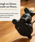 Sturdy Cast Iron Dog Door Stopper With Handle For Easy Moving showing rubberized base pad on wooden floor