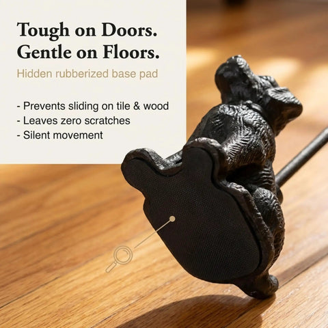 Sturdy Cast Iron Dog Door Stopper With Handle For Easy Moving showing rubberized base pad on wooden floor