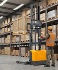 Compact Electric Pallet Stacker Rock Solid Workhorse 3300 Lb Capacity 138 Inch Max Lift Height Gel Battery Powered Forklift in warehouse.