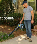Man using 4-cycle leaf blower for Self Propelled Gas Lawn Mower Kit With 21 Inch Cut 170cc Engine 3 In 1 Deck Mulch Side Discharge.