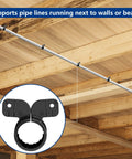 Nkiy Quen 3/4-in butterfly pipe clamps, black, 52 pcs for PEX/copper/CPVC tubing, shown installed on joists.