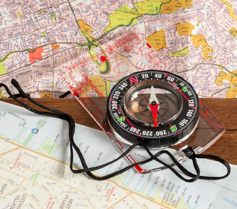 Hiking And Backpacking Compass For Quick Navigation Dope Field Tool With 360 Degree Bezel And Liquid Filled Needle on map