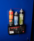 Magnetic Glove Dispenser For Wall Mount And Tool Bench Grab And Go Disposable Gloves Holder attached to metal surface with spray cans