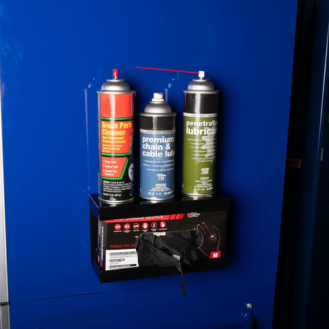 Magnetic Glove Dispenser For Wall Mount And Tool Bench Grab And Go Disposable Gloves Holder attached to metal surface with spray cans