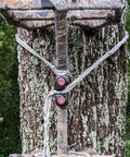 Four Pack Cam Cleats For Marine Gear Rock Solid Aluminum Rope Locks installed on a tree, securing ropes for sailboats and canoes.