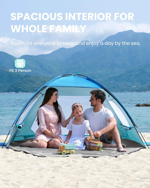 Family sitting in a Spacious Beach Tent For Three To Four People With No Fuss Setup Sun Shade Canopy, enjoying beach view.