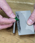 Using All In One Credit Card Diamond Sharpening Kit With 180 300 Grit And 600 1000 Grit Stones on a tool edge for precision sharpening.