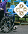 Image of a person in a wheelchair and a Wheelchair Front Fork Bearings Kit Four Piece Set For Walker Fork Stem Bearings
