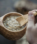 Kuksa Wooden Cup Handcarved 8 Oz Coffee Mug With Lanyard And Carabiner For Camping Outdoors, filled with oatmeal