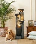 Outdoor 40 Inch Water Fountain With LED Lights 4 Tier Crocks Waterfall Decor For Garden Patio Deck Porch in living room setting with dog.