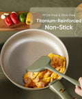 Cooking shrimp omelette in frying pan from 19 Piece Nonstick Pots And Pans Set With Detachable Handle For Easy Cleanup.