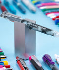 Top Shelf Premium Smooth Gel Pens That Glide Like Silk Without Skipping Or Smudging 12 Pack Of Precision 0.7Mm Black Ink Rollers Crafted For The Daily Grind displayed among colorful pens.