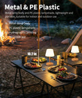 Outdoor dining scene with Cordless LED Wood-Grain Table Lamp With Waterproof Shower Design, illuminating a campsite table.