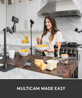 Mevo Start Wireless Streaming Cam With Legit 1080P HD Clarity in kitchen setup with vlogger preparing pasta dish.