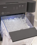 No Cap Portable Nugget Ice Maker Countertop Machine Produces Chewy Pebble Ice Built To Hit Different with ice bin filled with nugget ice.