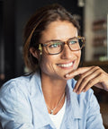 Woman wearing Glasses Strap Set, 3 Pack Gold Terylene Eyewear Lanyard with Alligator Clips, indoors setting.