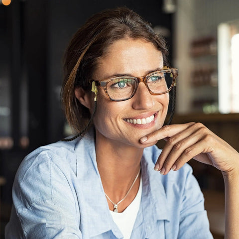Woman wearing Glasses Strap Set, 3 Pack Gold Terylene Eyewear Lanyard with Alligator Clips, indoors setting.