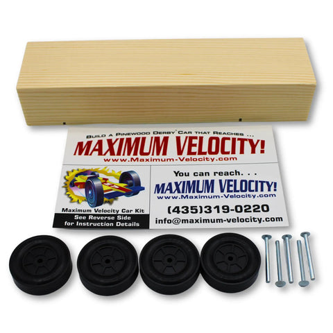 Bulk Pinewood Derby Car Kits Pack Of 12 With Wheels And Axles, pine block, four wheels, and axles displayed on a table