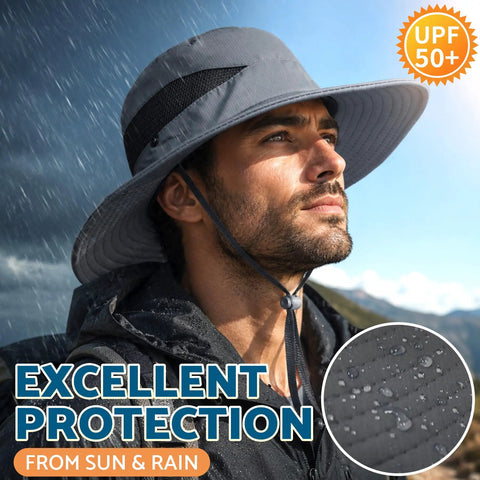 Wide Brim Bucket Hat With UPF 50 Plus Sun Protection, Breathable Mesh Vent, Great For Men And Women, Ideal For Outdoor Beach, Hiking, And Fishing, Durable Comfort Across All Day Wear, Dark Gray shown in rainy weather.