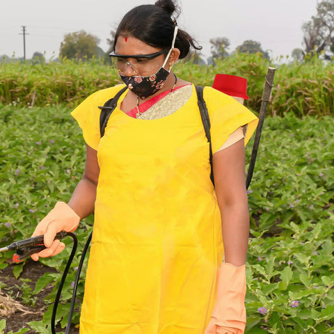 Person using backpack sprayer with Barrel Mouth Filter Strainer 142mm Outer Diameter Replacement in agricultural field.