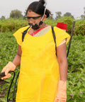 Person in yellow apron using sprayer with Gallon Sprayer Barrel Mouth Filter For Agriculture Sprayer 142 Millimeter Outer Diameter Filter Net Replacement Part For Knapsack Spray Tank To Boost Your Spray Game And Efficiency in field