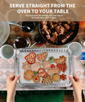 Hands holding 24 Pack Aluminum Disposable Cookie Sheets 16 By 11 Inch with cookies, perfect for baking and serving, nonstick oven safe.