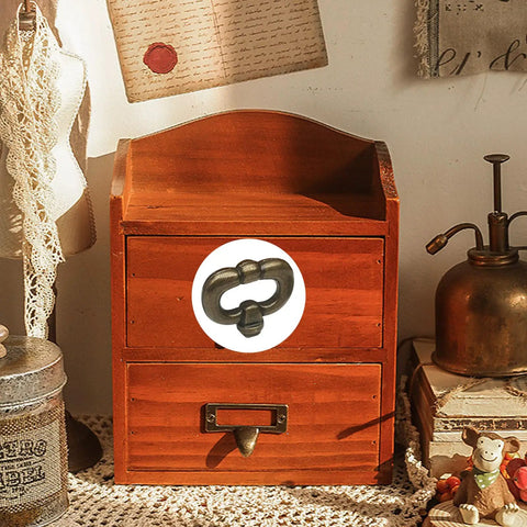 Two Pack Vintage Style Drawer Knob Ring In Antique Bronze on wooden cabinet display